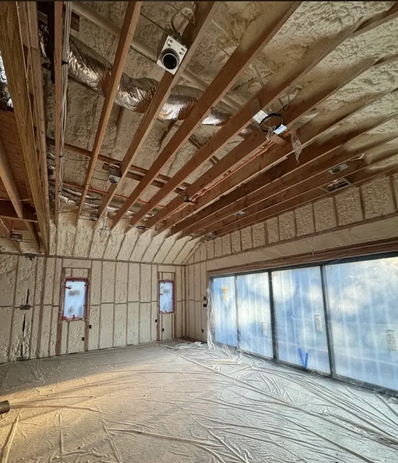 Interior walls and ceiling insulated with spray foam during new construction in Campton Hills